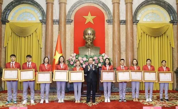 Chu tich nuoc bieu duong cac 'guong mat vang' cua The thao Viet Nam hinh anh 1