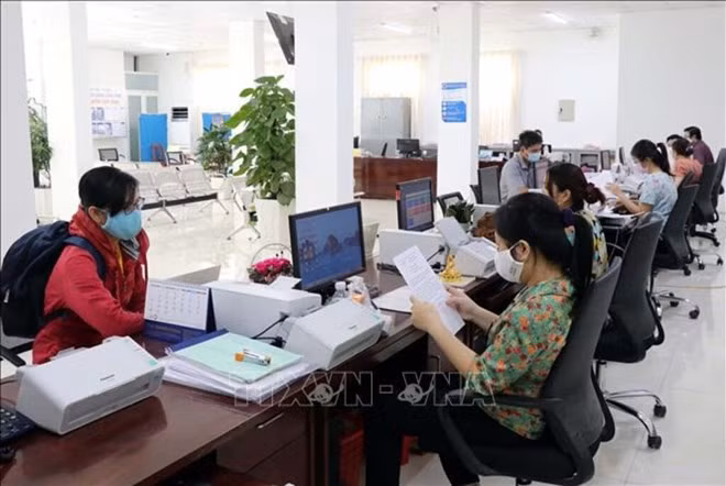 Thời gian cải cách tiền lương hoặc tăng lương cơ sở có thể diễn ra trong năm 2025 và 2026. Ảnh minh họa: TTXVN