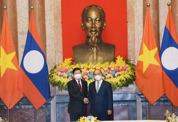 Chủ tịch nước Nguyễn Xuân Phúc và Tổng Bí thư, Chủ tịch nước Lào Thongloun Sisoulith - Ảnh: VGP/Nhật Bắc