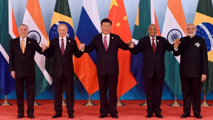 Hội nghị thượng đỉnh thường niên của BRICS sẽ không thảo luận về việc phát triển đồng tiền chung mới để thách thức sự thống trị của đồng đô la Mỹ. Ảnh: news.bitcoin.com
