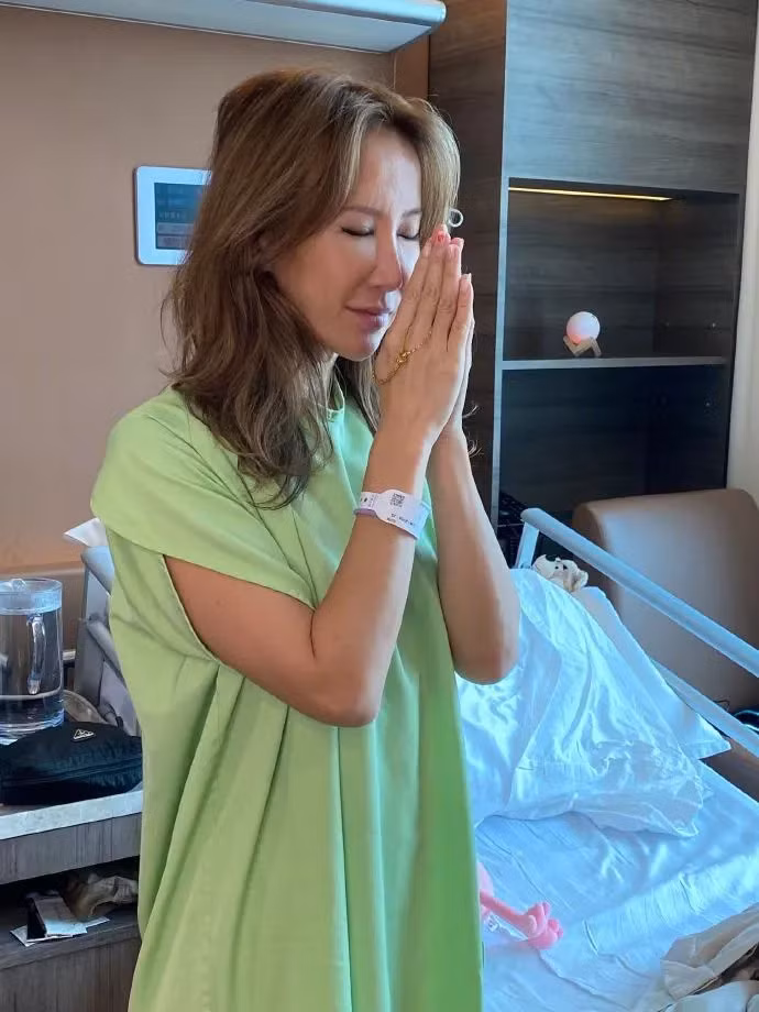 Coco Lee một mình chống chọi với bệnh tật, sức khỏe suy yếu trong những năm cuối đời. Ảnh: Xinhua