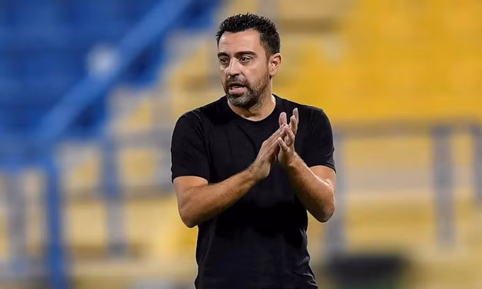 Xavi trở lại Barca sau sáu năm. Ảnh: EFE