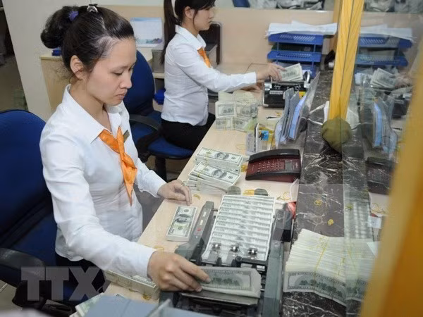 Ty gia USD tai cac ngan hang thuong mai dong loat tang manh hinh anh 1
