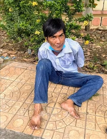Đối tượng Vũ Thượng Đỉnh bị khống chế tại hiện trường. Ảnh: TTXVN phát