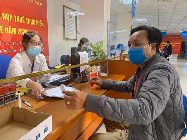 Luật Quản lý thuế 2019 giải thích về việc khai quyết toán thuế. Ảnh minh họa: VGP