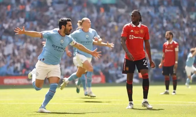 Gundogan vui mừng sau khi mở tỷ số cho Man City ở giây thứ 14 của hiệp một. Ảnh: AMA