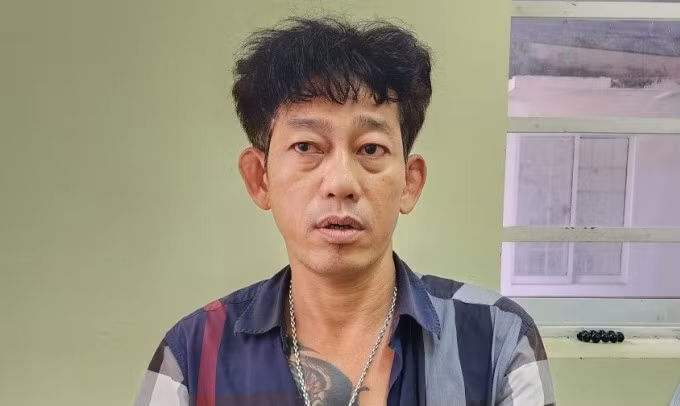 Nghi can Ông Minh Phụng tại cơ quan điều tra. Ảnh: Dương Đông