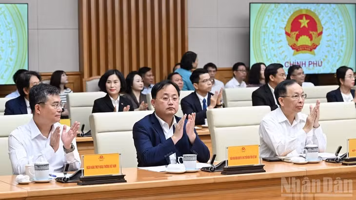 Các đại biểu tham dự cuộc làm việc. (Ảnh: TRẦN HẢI)