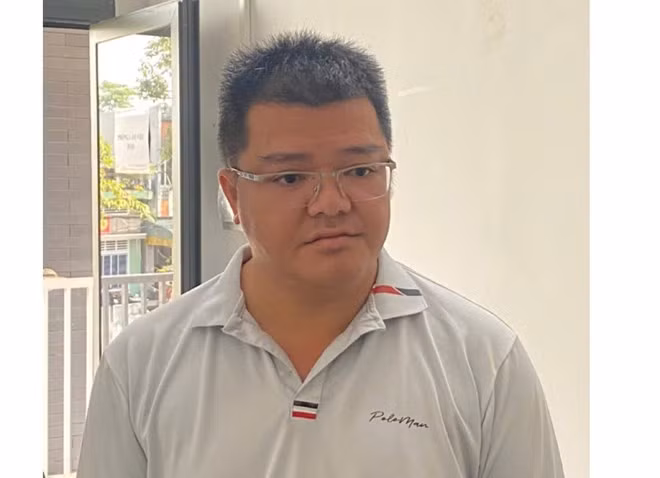 Hải nhận mình là nhân viên ngân hàng, lừa đảo làm hồ sơ vay vốn cho anh N. Ảnh: CACC