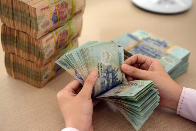 Bộ Nội vụ vừa có hướng dẫn cụ thể các đối tượng hưởng lương cơ sở từ 1/7. Ảnh: VGP