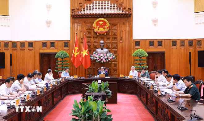 Thủ tướng Phạm Minh Chính chủ trì cuộc họp Thường trực Chính phủ về trung tâm tài chính quốc tế tại Thành phố Hồ Chí Minh và Đà Nẵng. (Ảnh: Dương Giang/TTXVN)
