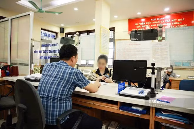 Giữ nguyên phụ cấp chức vụ lãnh đạo với công chức huyện về xã làm việc sau sáp nhập. Ảnh: Hải Nguyễn.