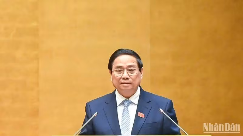 Thủ tướng Phạm Minh Chính trình bày Báo cáo của Chính phủ tại phiên khai mạc Kỳ họp. (Ảnh: DUY LINH)