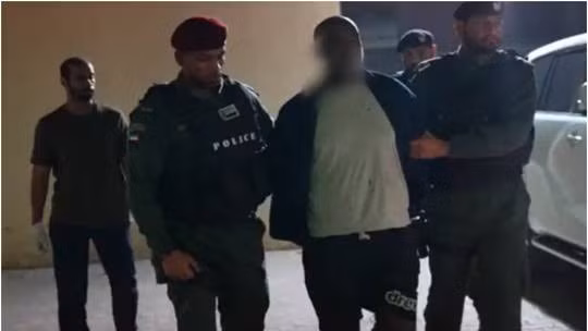 Kidane bị cảnh sát Interpol bắt giữ. Ảnh: Twitter/Interpol