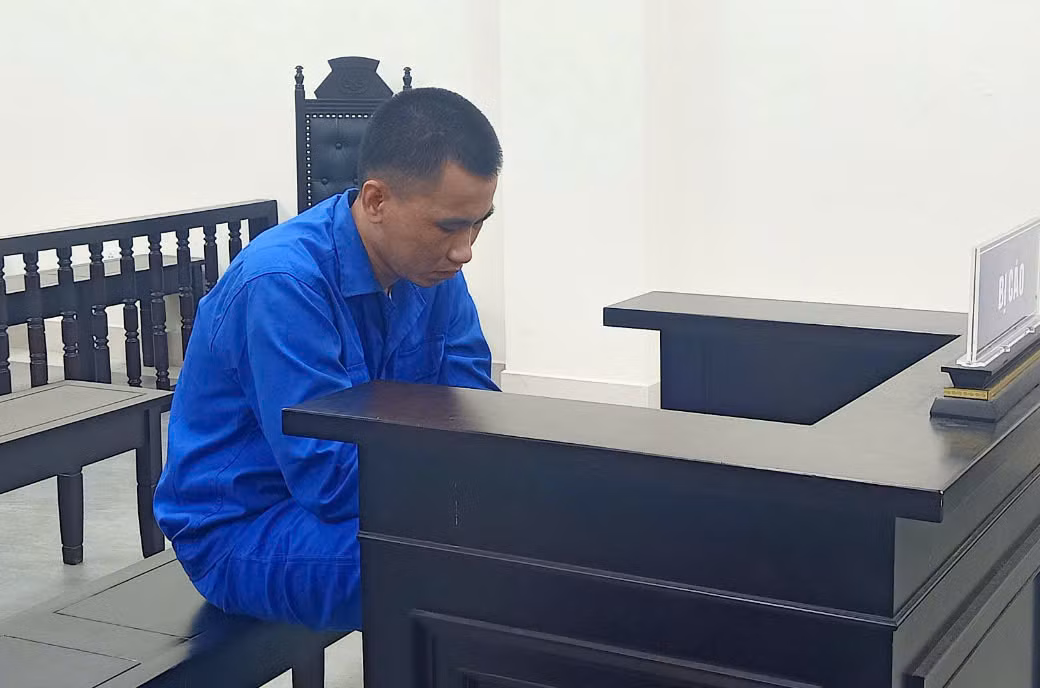 Bị cáo Nguyễn Quốc Việt tại tòa. Ảnh: HM