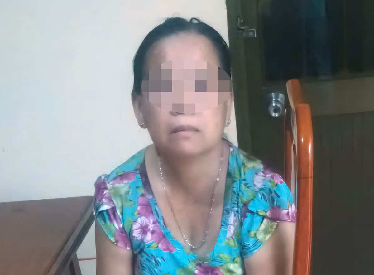 Bà P. tại cơ quan công an. Ảnh: E.X