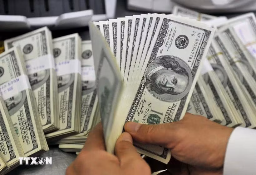 Đồng USD. (Ảnh: AFP/TTXVN)