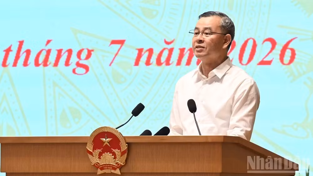 Bộ trưởng Tài chính Ngô Văn Tuấn báo cáo tại hội nghị. (Ảnh: TRẦN HẢI)