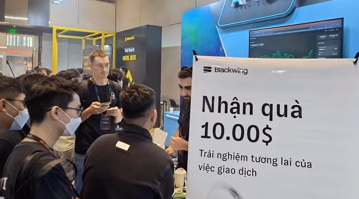 Một dự án giao dịch tài sản mã hóa quảng cáo tại một triển lãm ứng dụng công nghệ blockchain ở Việt Nam - Ảnh: ĐỨC THIỆN