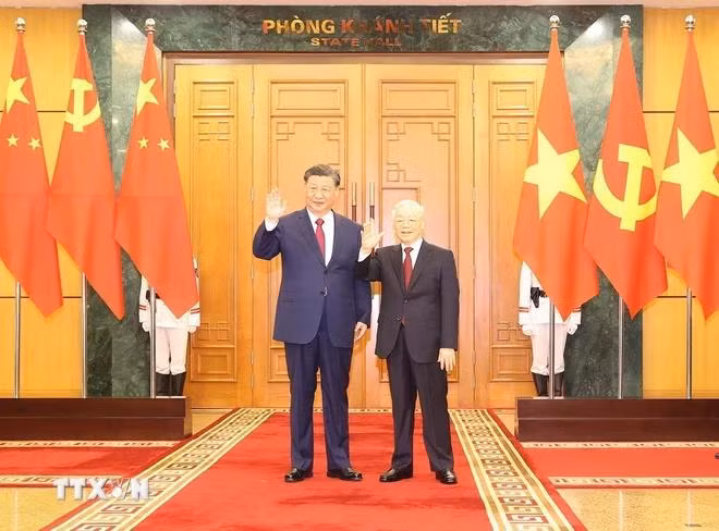 Tổng Bí thư Nguyễn Phú Trọng và Tổng Bí thư, Chủ tịch nước Trung Quốc Tập Cận Bình chụp ảnh chung. (Ảnh: Trí Dũng/TTXVN)