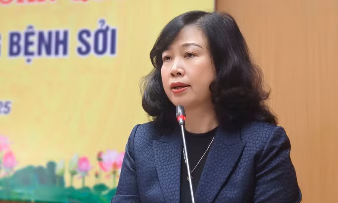 Bộ trưởng Đào Hồng Lan phát biểu tại hội nghị chiều 15/3. Ảnh: Tuấn Dũng