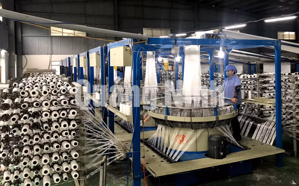 Dây chuyền sản xuất đóng gói bao bì của Công ty TNHH Bình An Việt Nam (9-2018). Ảnh: Khánh Giang
