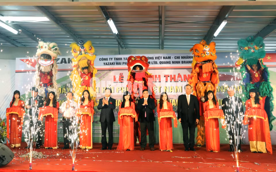 Khánh thành Nhà máy sản xuất hệ thống dây dẫn và các cụm thiết bị điện ô tô tại KCN Đông Mai (21-3-2015). Ảnh: Thu Trang