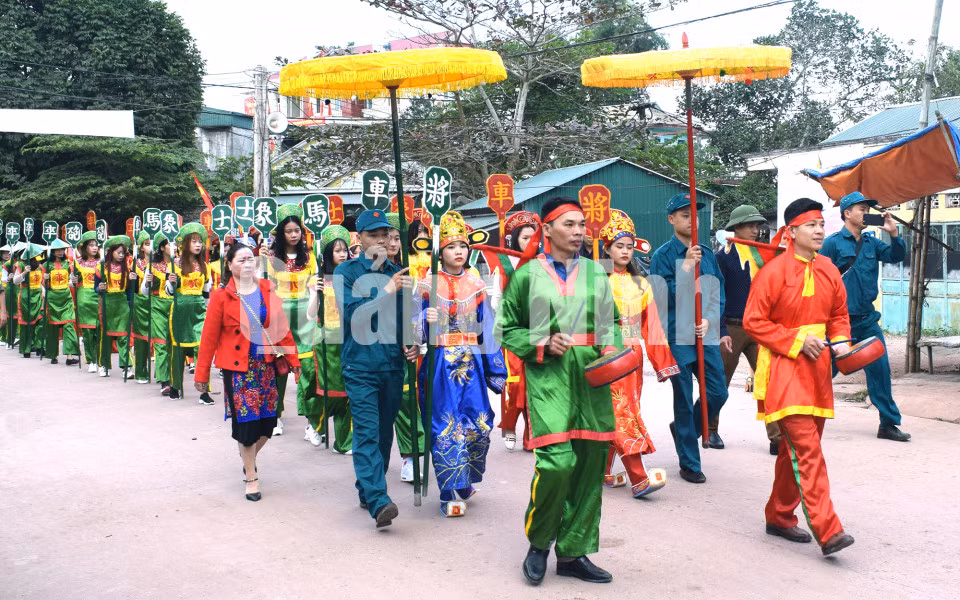 Lễ rước trong hội cờ người truyền thống xã Đài Xuyên, huyện Vân Đồn (2-2019). Ảnh: Thành Công