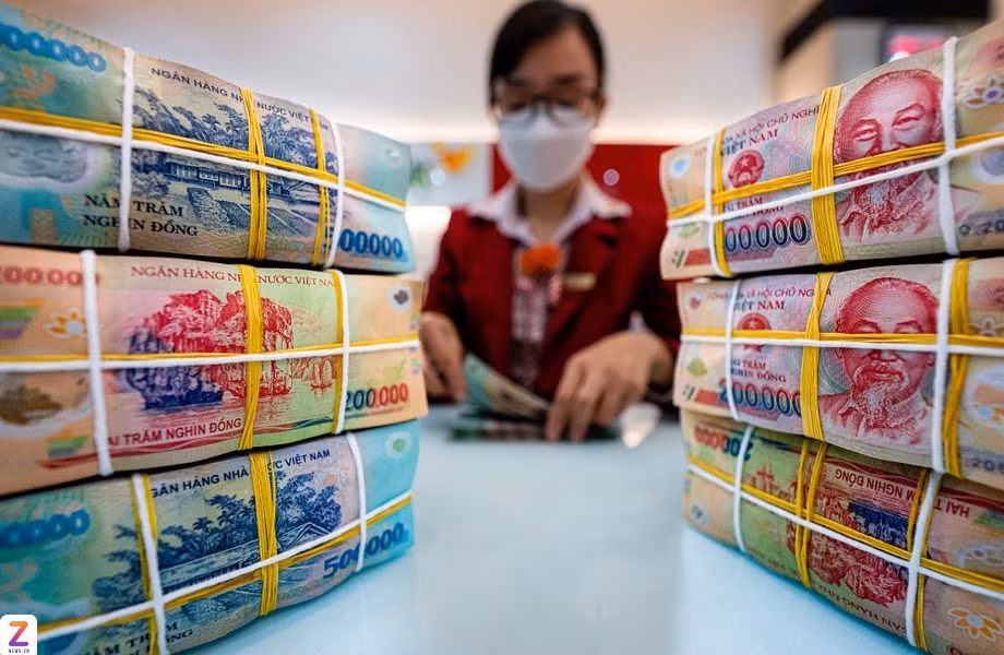 Các ngân hàng dồn dập hạ lãi suất theo chỉ đạo của Ngân hàng Nhà nước. Ảnh: Nam Khánh.