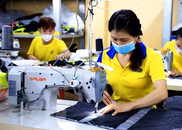 Doanh nghiệp dệt may tăng tốc về đích. Ảnh: Dony