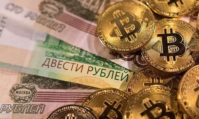 Nga đang tích cực dùng nội tệ và Bitcoin trong thanh toán quốc tế. Ảnh: Reuters