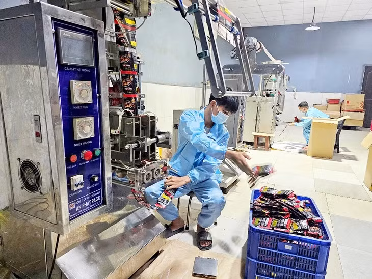 Nguồn tín dụng với lãi suất thấp sẽ là nguồn lực để các doanh nghiệp mở rộng sản xuất - Ảnh: NGỌC HIỂN