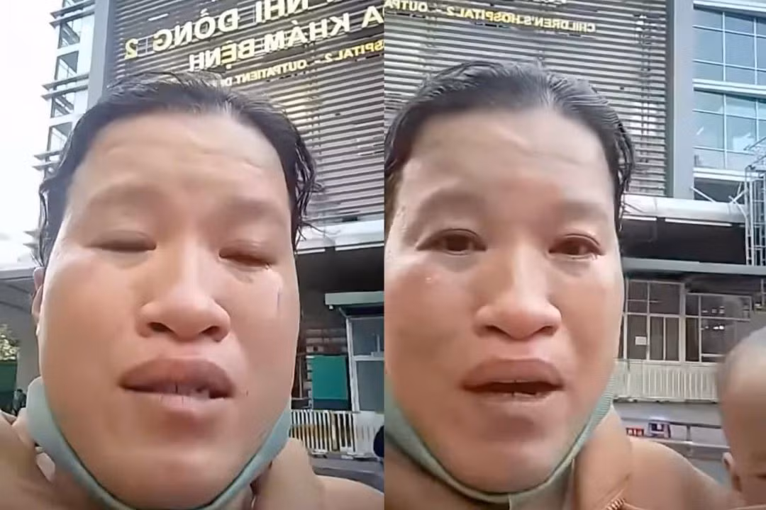 Người phụ nữ khóc lóc, nói rằng bị dàn cảnh móc túi tại Bệnh viện Nhi đồng 2. Ảnh: Cắt từ clip