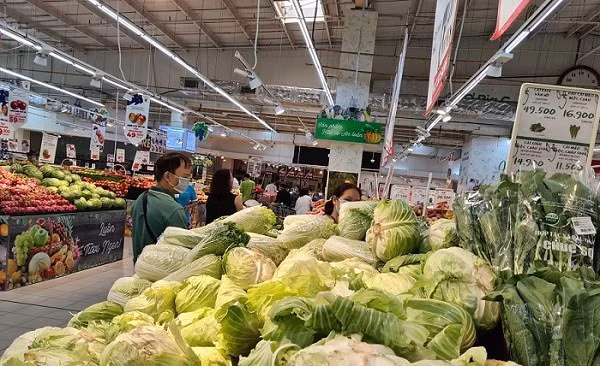 Nhiều bộ, ngành và địa phương đề xuất nâng mức giảm trừ gia cảnh để phù hợp với chỉ số giá cả hiện nay. Ảnh: Vũ Long