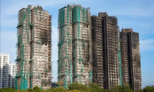 Vụ cháy chung cư ở Hong Kong (Trung Quốc): Bắt giữ thêm 8 đối tượng liên quan - Tưởng niệm các nạn nhân trong 3 ngày