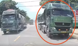 Xử phạt tài xế ô tô đầu kéo lấn sang làn ngược chiều để vượt xe