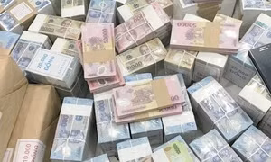 Đổi tiển lẻ, tiền mới để thu lời là trái pháp luật