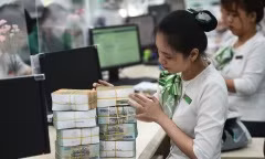 Người mua nhà, xe có thể vay ngân hàng này để đáo hạn ở nhà băng khác