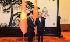 Chủ tịch nước Lương Cường hội kiến Ủy viên trưởng Nhân đại toàn quốc Trung Quốc Triệu Lạc Tế