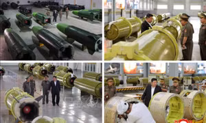 Nhà lãnh đạo Triều Tiên Kim Jong Un thị sát dây chuyền sản xuất tên lửa mới