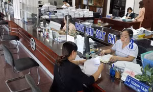 Kho bạc Nhà nước hạn chế tối đa sử dụng tiền mặt trong giao dịch