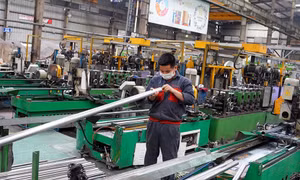 Kiềm chế lạm phát, tăng đà phục hồi kinh tế