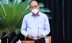Chủ tịch nước Nguyễn Xuân Phúc: Giãn cách phải gắn chặt với chăm lo đời sống người dân