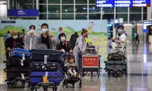 ​Trung Quốc nối lại hoàn toàn hoạt động đi lại với Hong Kong, Macau (Trung Quốc)