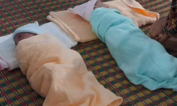 Hai con chào đời nửa đêm mùa dịch, cha đặt tên Cô Na và Cô Vy