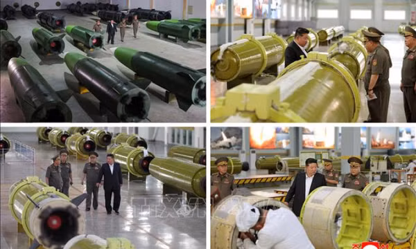 Nhà lãnh đạo Triều Tiên Kim Jong Un thị sát dây chuyền sản xuất tên lửa mới