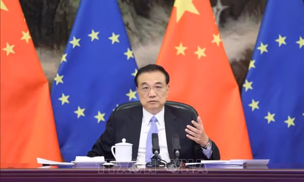 Trung Quốc tăng cường hợp tác với WTO và IMF