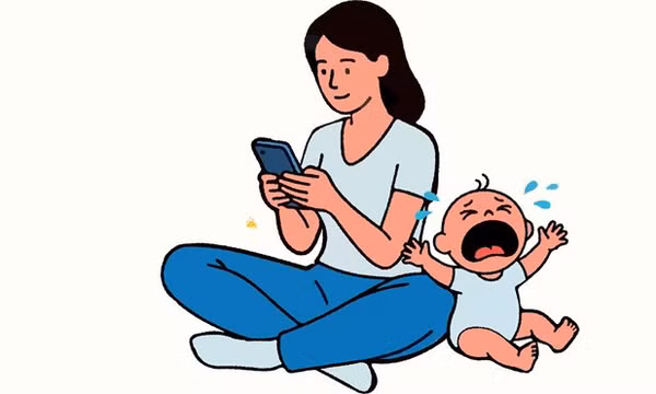 Những tác hại nguy hiểm khi cha mẹ dùng điện thoại lúc chăm trẻ sơ sinh