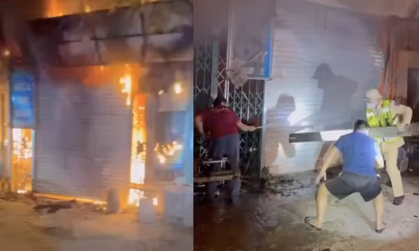 Cảnh sát giao thông phá cửa cứu 11 người khỏi đám cháy rạng sáng