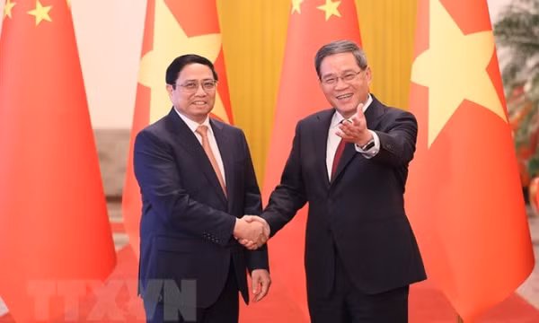Thủ tướng Lý Cường chủ trì Lễ đón Thủ tướng Phạm Minh Chính